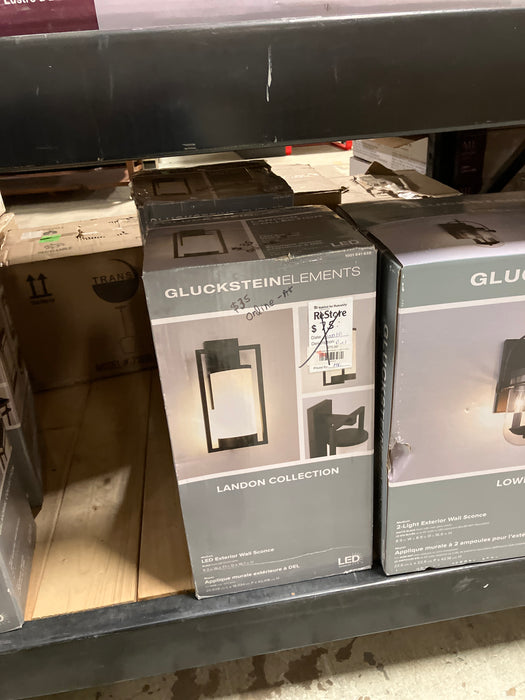 GlucksteinElements Landon 1-Light 17-inch H Integrated LED Outdoor Wall Sconce Light in Black Metal Finish with Frosted Glass (New)