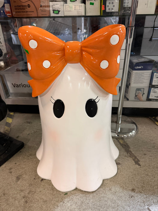 white ghost with orange bow