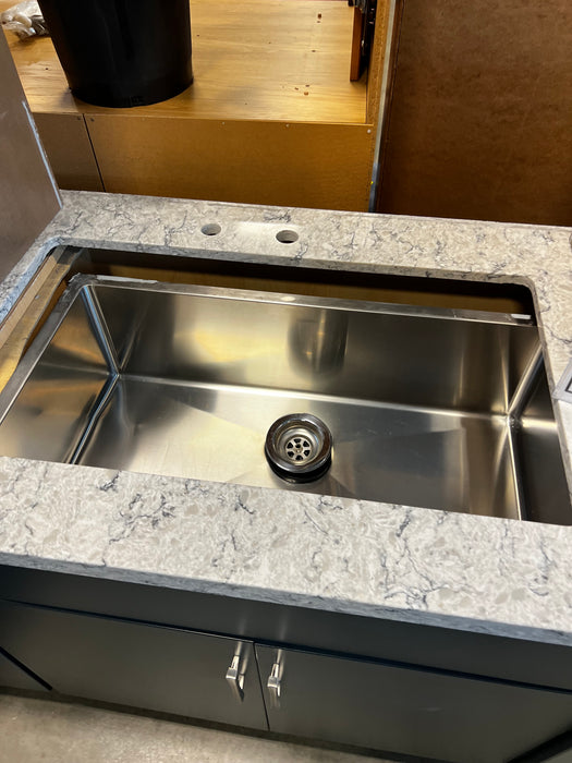 Navy and Faux Wood Kitchen Cabinet set with Silestone Countertop and Blanco Sink (showroom)