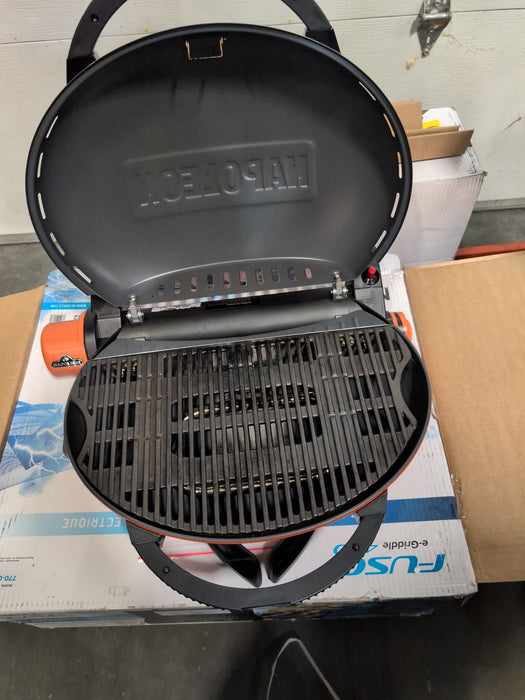 Napoleon TravelQ 1165 1-Burner Portable Propane BBQ Grill with Folding Legs and Ergonomic Handle in Orange (used)