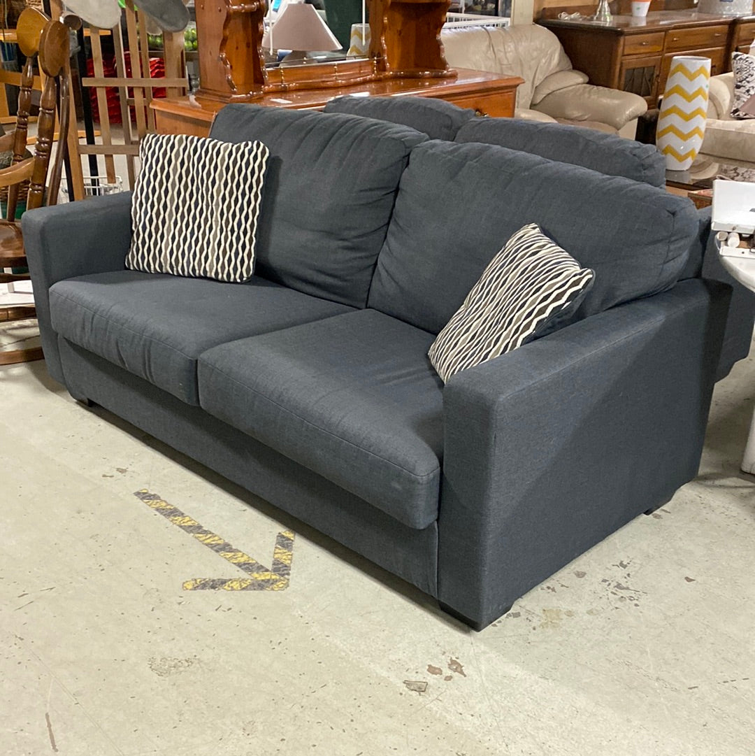 Grey Couch with Complementary Throw Pillows — Habitat for Humanity