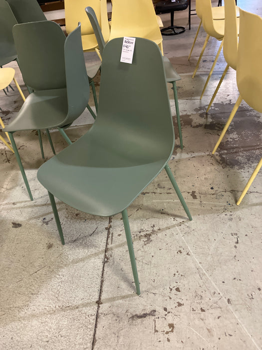 Modern plastic dining chair with metal legs