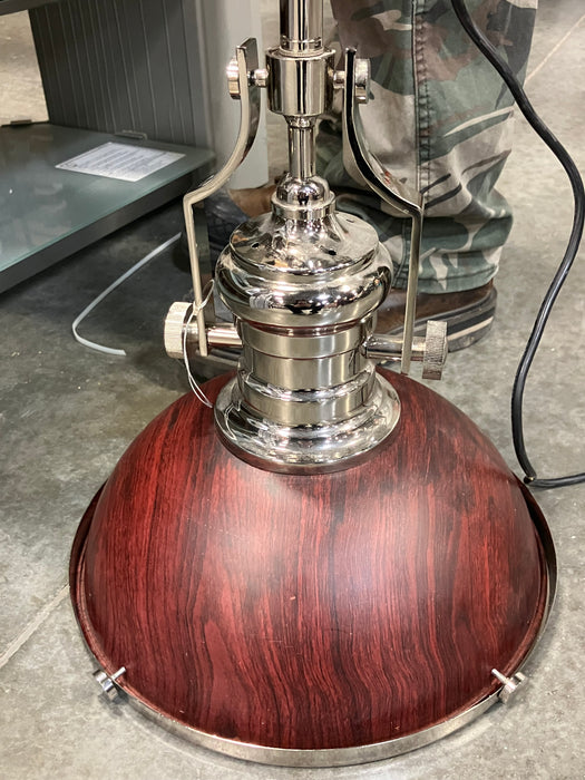 Industrial-Style Pendant Light with a chrome Finish and a Reddish-Brown Shade.
