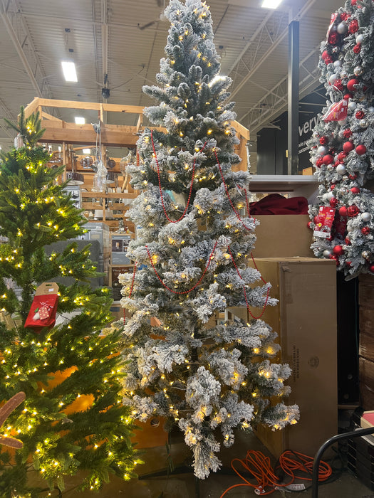 Home Accents Holiday 9ft. Pre-Lit 550L LED Wesley Slim Flocked