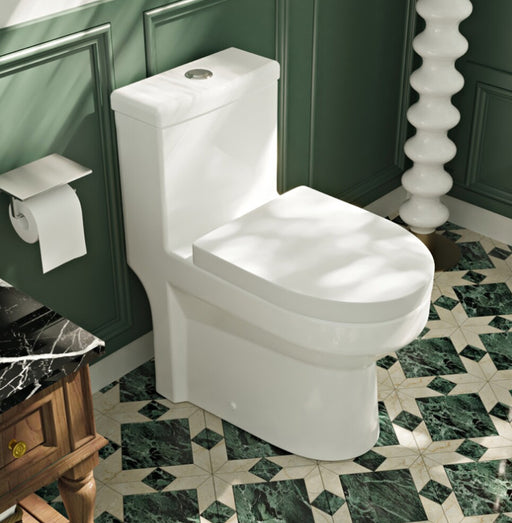 White toilet in a bathroom with green walls and marble floor