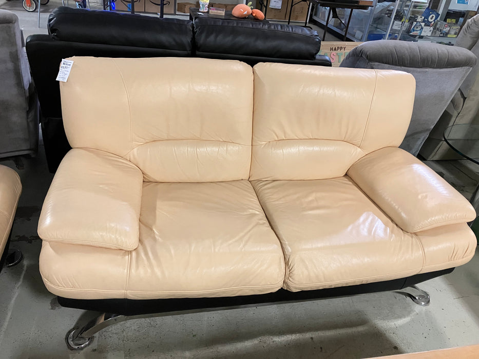Tan leather Loveseat (used)