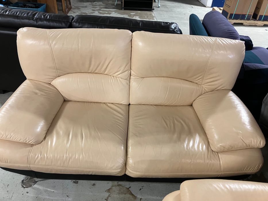 Tan leather Loveseat (used)