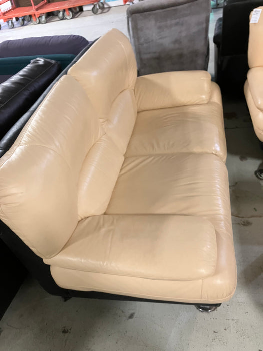 Tan leather Loveseat (used)