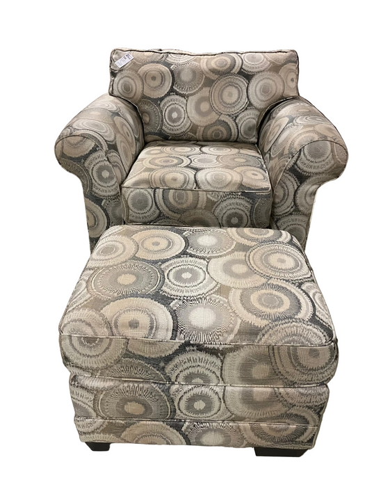 Light-colored armchair with ottoman (used)