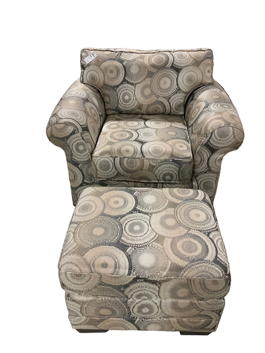 Light-colored armchair with ottoman (used)