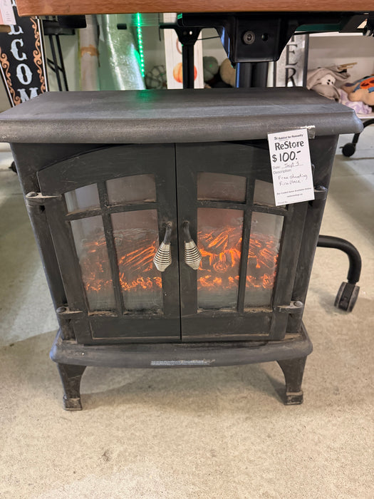 free standing firplace (used)