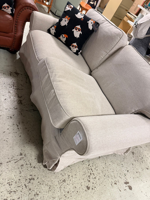 beige loveseat (used)