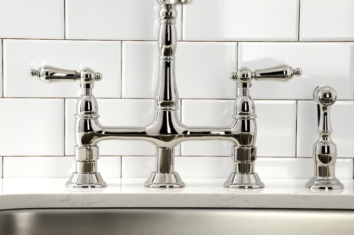 Kingston Brass Heritage 2-Handle Bridge Kitchen Faucet with Side Sprayer in Polished Nickel