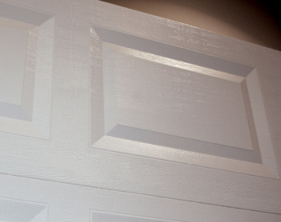 Clopay Classic Steel 16 ft. x 7 ft. Non-Insulated Solid White Garage Door (new)