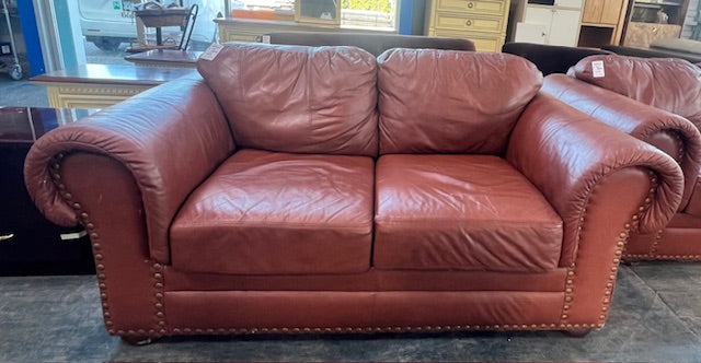 Burnt Orange Two Seater Couch (used)